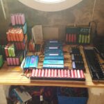 Glubux assembling laptop battery packs inside his workshop for his long-running DIY solar power system