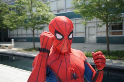 Spider-Man near white building