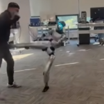 Unitree G1 humanoid robot mirroring a trainer’s kick and accidentally striking him in the groin