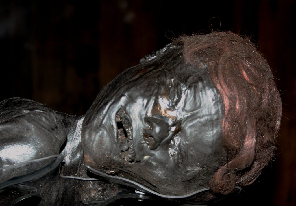 Close-up of Grauballe Man's face showing remarkable preservation after 2,300 years